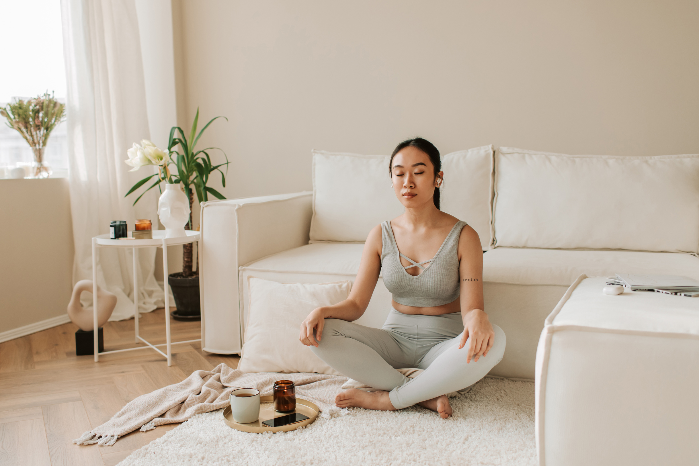 Woman Meditating at Home
